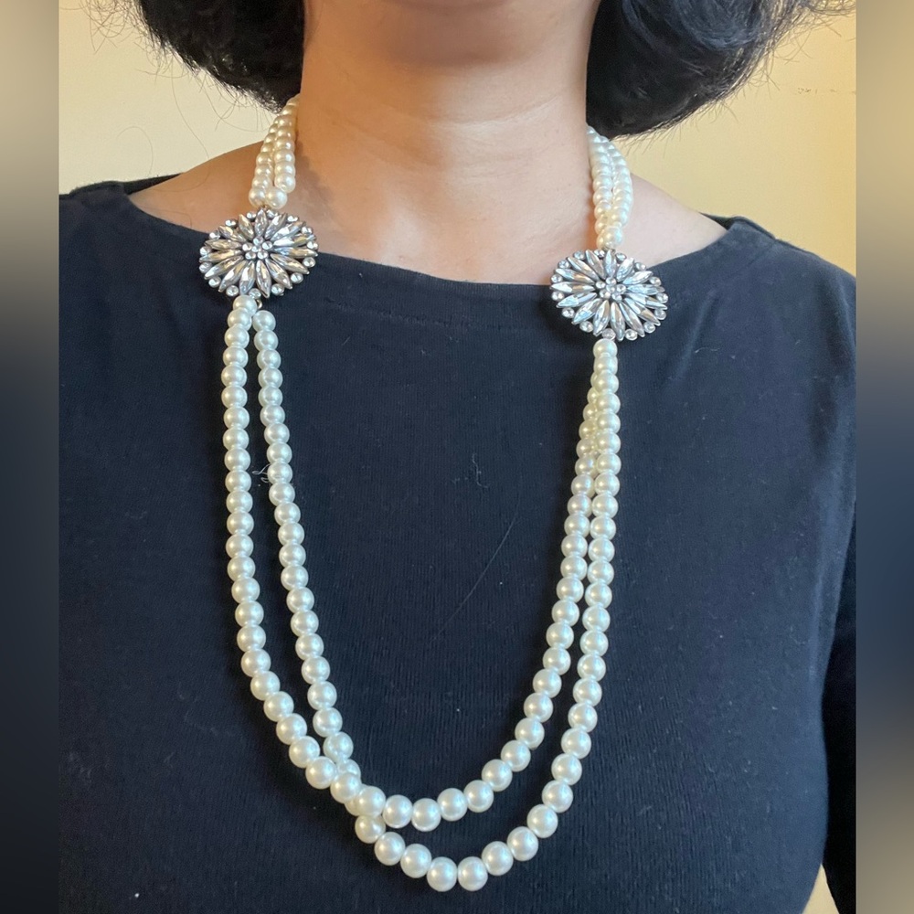 Double string pearl necklace.